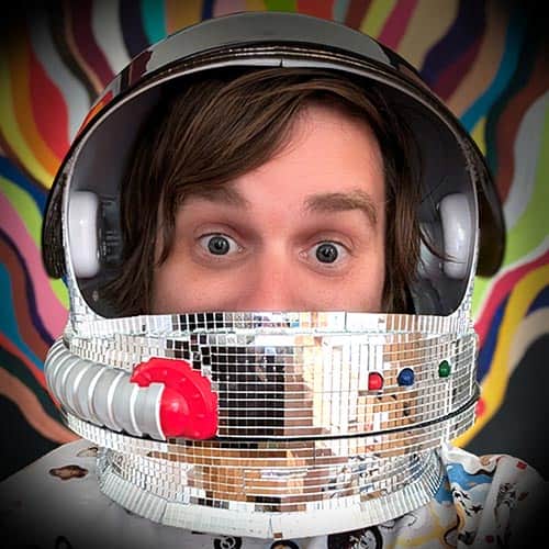 Brad Frost wearing a mirrored astronaut helmet